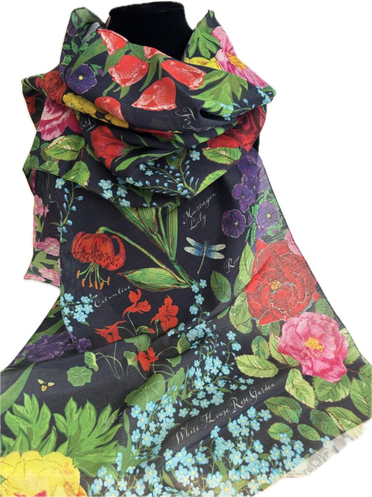fullsizeoutput_9a42 A black scarf with flowers and leaves on it